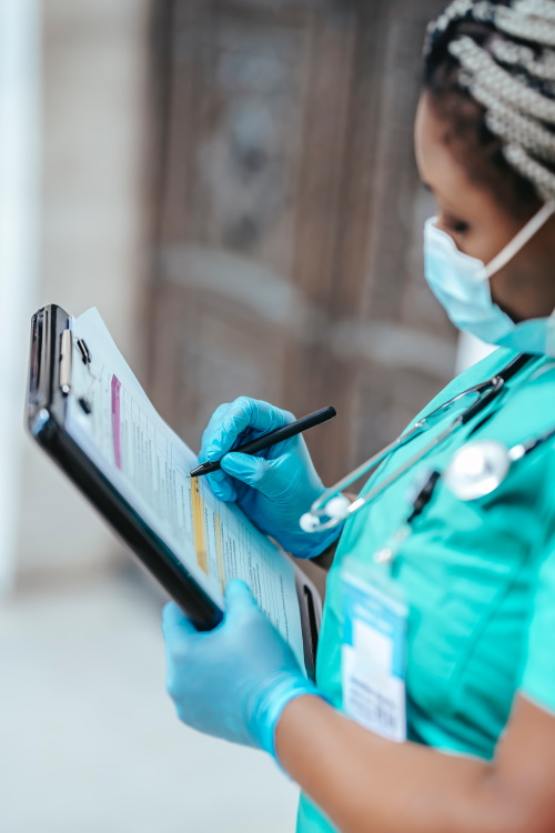 Nurse Completing Medical Assessment