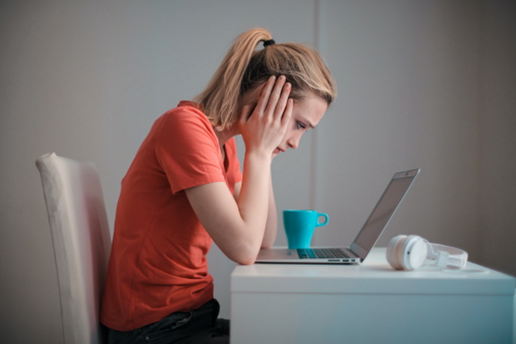 Women Stressed at computer